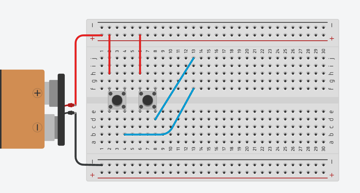 Creating the alarm node by joining both push buttons with blue jumper wires