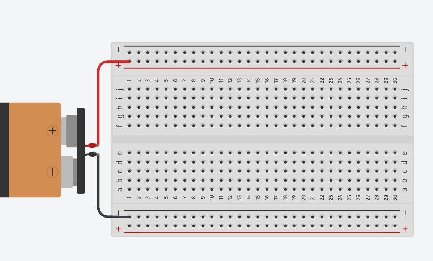 Connecting the battery's positive and negative wires to the breadboard power rails